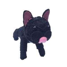 a black stuffed animal with pink tongue and nose