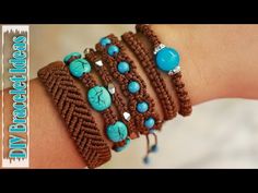 a woman's arm with several bracelets and beads on it, including turquoise stones