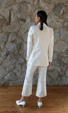 SILK TAFFETA SUIT JACKET AND PANTS BRIDAL SUIT. IVORY SATIN LINER. PANT CAN BE ORDERED CROPPED OR FULL LENGTH. *POCKET SQUARE, VEST, NECK TIE, OR ASCOT ALL AVAILABLE TO ORDER SEPARATELY. DOS PIECES SIMILAR TO THIS BRIDAL PANT SUIT: IF YOU’RE LOOKING FOR A SILK BRIDAL SUIT CHECK OUT OUR "LAURENT" SUIT BY CLICKING ON THE LINK ASSOCIATED. Tailored White Wedding Bottoms, Tailored White Pants For Wedding, Tailored Single Breasted Wedding Pantsuit, Tailored Notch Lapel Pantsuit For Wedding, Tailored Single Breasted Pantsuit For Wedding, Tailored Single-breasted Pantsuit For Wedding, Wedding Tuxedo Pantsuit With Notch Lapel, Bridal Pant, Bridal Pant Suit