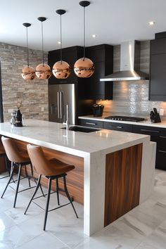 Modern kitchen with a large island, marble countertops, wooden accents, and three pendant lights. Island For Dining Table, Double Sided Kitchen Island, Modern Island Kitchen, Floating Kitchen Island, Metal Kitchen Island, Functional Kitchen Island, Green Kitchen Island, Distressed Kitchen, Blue Kitchen Island