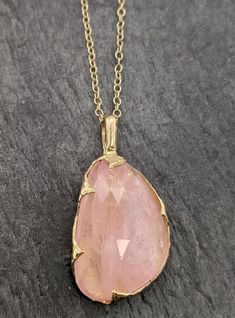 "Fancy cut pink Morganite 18k gold Pendant Gold Necklace gemstone Jewelry byAngeline Morganite feels so soft, gentle and loving. I hand carved this pendant in wax and cast it in solid gold using the lost wax casting process. This one of a kind pendant comes on a solid 18k 18\" chain. The stone measures about 16x25mm. If you don't need a chain for the Pendant please ask about a price reduction to ship w/o chain. Throughout all time and history, in every tribe and culture all around the world crys Morganite Fine Jewelry In Yellow Gold, Luxury Gold Morganite Jewelry, Fine Gold Morganite Jewelry, Exquisite Gold Morganite Jewelry, Yellow Gold Pendant Jewelry With Large Stone, Fine Jewelry Gold With Large Stone, Gold Fine Jewelry With Large Stone, Pink Kunzite Jewelry For Wedding, Luxury Carved Yellow Gold Necklaces