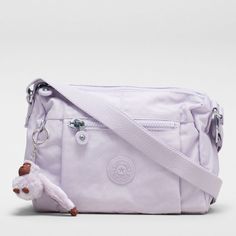 Dive into the day with the Kipling Wes cross-body bag, your compact yet capacious companion for every adventure. Crafted from polyamide, this small crossbody bag boasts a removable shoulder strap adjustable to your comfort, and a variety of compartments for keeping organised on the go. Whether you're navigating the urban jungle or embarking on weekend escapades, the Wes is ready to go wherever life takes you. Kipling Crossbody Bag, Tote Bags For College, Kipling Bags, Molton Brown, Bangle Watches, Urban Jungle, Small Crossbody Bag, Small Crossbody, Accessories Diy