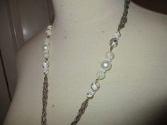 "26\" long. This necklace has white beads with gold swirls, AB faceted crystals and faux pearls. Marked Coro on clasp. @ 1960's. Nice condition but has a bit of finish wear to the gold chain. I ship same or next business day. More photos @ //www.tradesy.com/accessories/other-vintage-coro-tassel-necklace-183652/?tref=closet" White Pearl Necklace With Round Beads, White Beaded Pearl Chain Necklace, White Pearl Beaded Chain Necklace, White Beaded Necklaces With Round Beads And Chain, White Beaded Chain Necklace For Party, White Beaded Long Chain Necklace, Bohemian White Pearl Chain Necklace, Vintage White Necklace With Beaded Chain, Vintage White Beaded Chain Necklace