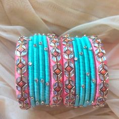 Peach and aqua green kundan silk thread bangles. Stone Bangles