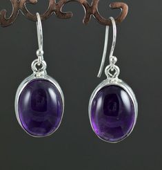 * Sterling Silver Amethyst Earrings. * These measure approximately 16mm X 12mm * These are standard 20g earrings. * You will receive the exact pair pictured. Nickel-free Round Purple Earrings, Classic Round Amethyst Earrings, Hypoallergenic Round Purple Earrings, Hypoallergenic Purple Round Earrings, Fire Agate Ring, Rutilated Quartz Ring, Labradorite Earrings, Agate Ring, Amethyst Earrings