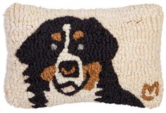 a black and brown dog is on a white pillow with the words, i love you