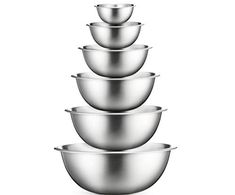 five stainless steel bowls stacked on top of each other in the shape of a pyramid