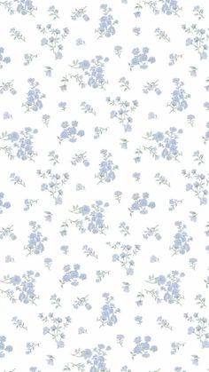 a white and blue flowered wallpaper with small flowers