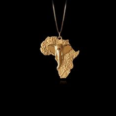 Explore the rich heritage and beauty of the African continent with our solid gold Africa map pendants, proudly crafted in the USA. Each piece is a celebration of African culture, designed for those who hold Africa close to their hearts. PENDANT INFORMATIONThis pendant is made of real, solid gold.• Made in USA• Material: 14k or 18k solid gold• Finish: polished• Height: 1.2" (30 mm) x Width: 1.1" (28 mm)• Pendant weight: approx. 6 grams (14k)• Bail: fits up to 4 mm chains• Solid back, not hollow• Map Jewelry, African Continent, Map Pendant, Africa Map, Solid Gold Chains, Mini Pendants, African Culture, Yellow Gold Pendants, Elegant Jewelry