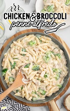 chicken and broccoli penne alfredo in a skillet with a wooden spoon