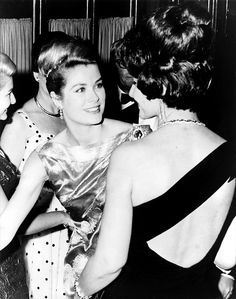 black and white photograph of two women sitting next to each other