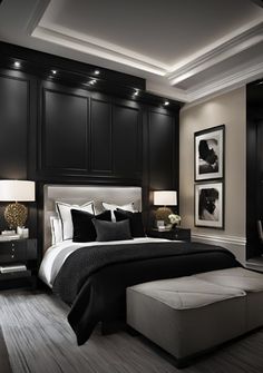 a bedroom with black and white decor in it