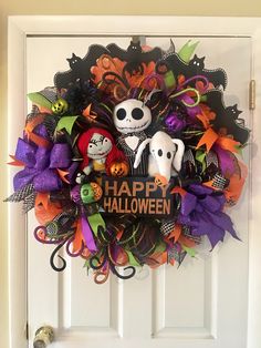 a halloween wreath on the front door