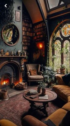 a living room filled with lots of furniture and large arched windows next to a fire place