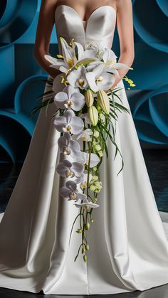 Exotic Orchid and Lily Cascade Wedding Bouquet Lilies For Wedding, Lilies And Orchids Bouquet, Waterfall Orchid Bouquet, Orchid Waterfall Bouquet, Orchid And Calla Lily Bouquet, Cascading Flower Arrangements, Cascading Wedding Bouquets Orchids, Unique Flower Bouquet Ideas, Orchid And Lily Bouquet