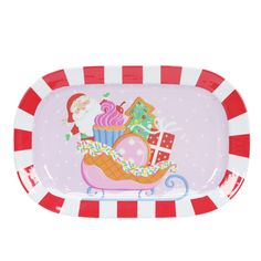 a pink and red striped tray with santa clause on it's sleigh