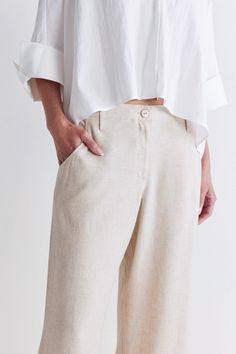 Embodying relaxed sophistication, these breezy bottoms offer a comfortable fit and a laid-back vibe, ideal for effortless style on warm days. Perfect for pairing with a shirt or dressing up with a blouse for some versatile, chic looks. Relaxed fit Side pockets Elasticized waist with button closure Tapered length Effortless Relaxed Fit Straight Leg Pants, Effortless Straight Leg Bottoms For Workwear, Effortless Straight Leg Pants For Workwear, Effortless Summer Bottoms With Pockets, Linen Tapered Leg Pants For Daywear, Effortless Wide-leg Bottoms With Relaxed Fit, Tapered Leg Linen Pants For Daywear, Classic Straight Pants For Loungewear, Relaxed Straight Leg Work Pants