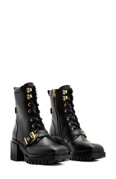 A chunky lugged sole and heavy-duty gilded hardware add to the biker-inspired edge of this combat boot finished with a sharply squared-off toe. 2 1/2" heel 6 3/4" shaft Lace-up style; side zip closure Leather upper and lining/synthetic sole Made in Portugal Shoe Goals, Nike Shoes For Sale, Womens Combat Boots, Oversized Tote Bag, Black Combat Boots, Fig Leaves, Studded Boots, Combat Boot, Fabric Gift Bags