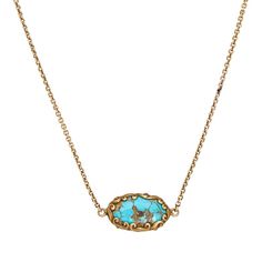 Stylish and finely detailed antique Art Nouveau watch chain necklace crafted in 14k yellow gold (circa 1900s to 1910s).  Originally a watch chain, the floral embossed and turquoise set ornament is a unique feature of the chain. Measuring 16 1/2 inches the chain sits nicely as a choker style at the nape of the neck. We recently added an 8mm ring that clips to the dog clasp and allow charms or pendants to be added to the chain to create your own unique look. The necklace is in good condition with patina evident. Note: previous repair evident to the chain.  Particulars:  Weight: 8 grams  Stones: N/A  Size & Measurements: The necklace measures 16 1/2 inches in length. The turquoise ornament measures 3/4 x 1/2 inch.  Metal & Hallmark: 14k yellow gold. The chain is not hallmarked though it has t Formal Turquoise Engraved Jewelry, Gold Oval Turquoise Gemstone Necklace, Elegant Gold Turquoise Necklace With Oval Pendant, Victorian Turquoise Jewelry For Formal Occasions, Elegant Antique Gold Cabochon Necklace, Heirloom Turquoise Necklace As Gift, Heirloom Turquoise Necklace For Gift, Victorian Turquoise Pendant Jewelry, Turquoise Cabochon Necklace For Formal Occasions