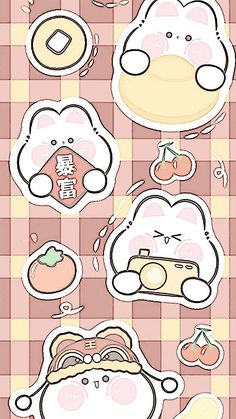 some stickers that are on top of a checkered table cloth with food items