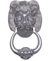 an elephant head is attached to the handle of a metal door knocket with a lion's face on it