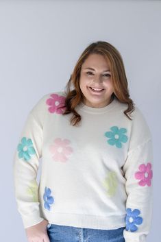 Are you ready to brighten everyone's day with our Flower Power Daisy Print Sweater!? This white knit sweater has the most adorable pastel daisy print that is perfect to help you transition from Winter to Spring. This sweater is perfectly light weight and detailed with a ribbed contrast hem around the round neckline and arm cuffs. Pair it with jeans on a chilly day, or with shorts for the perfect Spring look! - White knit sweater with pastel daisy print - Light weight knit sweater - Ribbed contra White Soft Knit Sweater For Spring, Playful White Sweater For Spring, White Crew Neck Sweater For Spring, Cream Crew Neck Sweater For Spring, White Knit Tops With Floral Print, Playful White Knit Sweater, Cute Crew Neck Sweater For Spring, Trendy Cream Sweater For Spring, White Floral Print Sweater For Spring