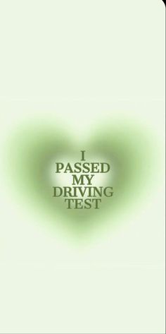 the words i passed my driving test are shown in green and white with an image of a heart