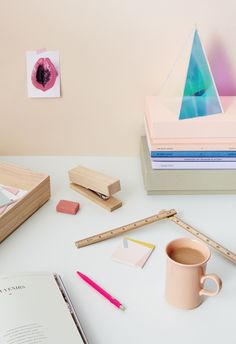 the personal workspace on pinterest is filled with things like pencils, books and paper