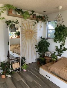 a bedroom with plants on the wall and a bed