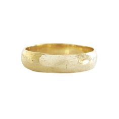 a gold wedding ring with a textured finish on the outside and inside, against a white background