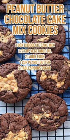 chocolate cookies with peanut butter in the middle on a cooling rack, ready to be eaten