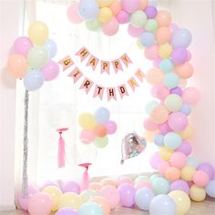 a birthday party with balloons and streamers