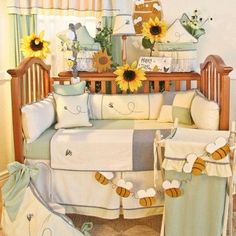 a baby crib with sunflowers and bees on it