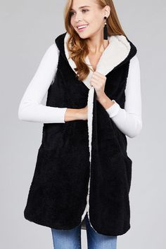 Stay nice and warm this winter in this super plush fluffy vest. It will feel like you are being hugged by a warm cloud. These run true to size. Fabric Content 100% POLYESTER Sleeveless Vest With Fleece Lining For Winter, Winter Sleeveless Vest With Fleece Lining, Sleeveless Sweater Vest For Winter, Winter Sweater Vest For Cold Weather, Winter Sleeveless Sweater Vest For Cold Weather, Hooded Plush Outerwear For Winter, Cozy Winter Vest For Cold Weather, Fluffy Vest, Vest With Pockets