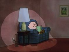 a cartoon character laying in a chair with a lamp on top of it's head