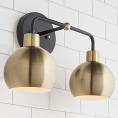 an image of two light fixtures on the wall