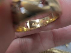 "A beautiful vintage 1970's wedding band, new old stock, never worn. This ring is done in solid 14kt. yellow gold. It is a chain link design, with the \"links\" being satin finish and the bottom of the shank a polished gold finish. 8 sparkling genuine diamonds are set in the top \"link\". Each diamond is 1mm across and is about 1 1/2points. They add just enough sparkle without being flashy. At its widest it measures 3/8\" north/south. Total weight is 5.6gms., and measures a size 6 on the ring ma Yellow Gold Diamond Ring With Hallmarks For Wedding, Gold Signet Ring With Diamond Accents For Wedding, Gold Signet Wedding Ring With Prong Setting, Gold Signet Ring With Prong Setting For Wedding, 1970s Wedding, Link Design, Initial Ring, Palm Beach Fl, North South