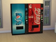 two vending machines with coca - cola and pepsi on them in an empty room