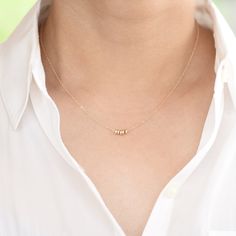 14K Gold Dainty Beads Necklace. 14K gold delicate necklace. 14K gold small beads necklace. The necklace will be shipped in a gift box. ★ 14K yellow gold bead is 3mmx 1.5mm. ★ The necklace is 14K yellow gold 1.2mm flat cable chain. Please read our policies before you place your order. https://www.etsy.com/shop/SashJewelry/policy?ref=shopinfo_policies_leftnav To see other Mother daughter necklace set click here: https://www.etsy.com/shop/SashJewelry?section_id=12441134&ref=shopsection_leftnav_ Delicate Gold Beads Beaded Necklace As Gift, Dainty Yellow Gold Beaded Necklace Gift, Minimalist Gold Beads Necklace, Delicate Necklace With Tiny Beads For Gifts, Dainty Beaded Necklace For Gift, Delicate 14k Gold-filled Necklace With Tiny Beads, 14k Yellow Gold Necklaces With Tiny Beads, 14k Gold Beaded Necklace For Gift, 14k Yellow Gold Necklace With Tiny Beads