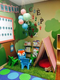 a child's playroom with toys and decorations on the walls, carpeted in green grass