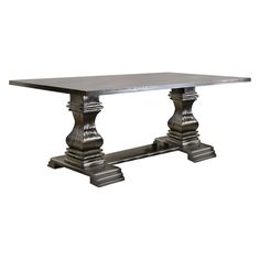 a table that is made out of metal and has two pedestals on each side