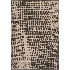 a black and white rug with an abstract design