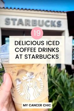 someone holding up a starbucks drink with the words delicious iced coffee drinks at starbucks's