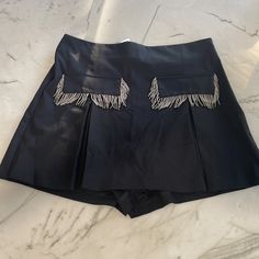 Zara Skort With Fringing Black Size Small 2407/535/800 Made In Morocco 63% Polyester 33% Viscose 4% Elastane Chic Skort With Pockets For Night Out, Elegant Short Bottoms For Party, Elegant Short Skirt For Parties, Elegant Short Party Bottoms, Elegant Skort For Spring Night Out, Elegant Skort For Night Out In Spring, Short Pleated Party Bottoms, Chic Short Skort For Party, Chic Cocktail Bottoms With Short Length