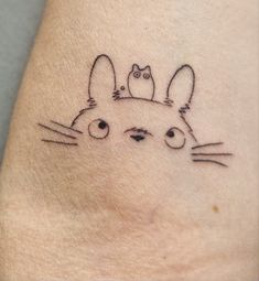 a small tattoo on the leg of a person