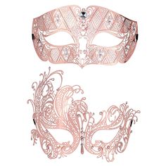 two pink masquerades with intricate designs on them, one in the shape of a mask