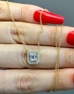 Metal: 14kt White Or Yellow Gold. The yellow gold version is currently sold out. Stone: Diamond Shape: Round And Baguette Diamond Weight: .41 ctw Weight of entire necklace: 2.23 grams Type of Chain: 1mm Cable Chain Length Of Chain: The Necklace Can Be Worn From 16 to 18 inches Length Of Center Diamond Halo: 10mm Width Of Center Diamond Halo: 10mm Luxury Diamond Halo Necklaces, Luxury Gold Diamond Necklace With Halo Design, Fine Jewelry Yellow Gold Diamond Necklace With Baguette Diamonds, Fine Jewelry Yellow Gold Necklace With Baguette Diamonds, Luxury Diamond Necklace With Vvs Clarity And Emerald Cut, 14k Gold Emerald Cut Fine Jewelry Necklace, Luxury Emerald Cut Diamond Necklace With Vvs Clarity, Luxury Emerald-cut Diamond Necklace With Vvs Clarity, Gold Jewelry With Diamond Accents And Baguette Cut