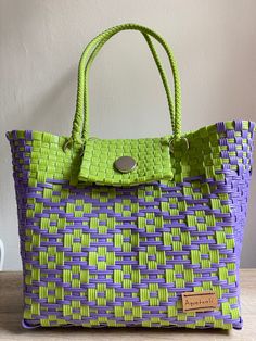 Handmade plastic handbag - Artisan made - Mexican handbag/purse - Handicraft bag  Super small business!  100% Handmade in Mexico. Braided bag made with love and recycled plastic hand-woven by Mexican artisan (my mom!).  Closes with a magnetic closure. - Snaps on the side - Includes 1 tassel*  - Each one is a unique model - Multicolor  - Washable - Original designs - Highly resistant recycled plastic * If you have a tassel preference, leave me a note with one or two options and I'll try to includ Mexican Bags Handbags, Wire Basket Ideas, Plastic Handbag, Mexican Bag, Braided Bag, Woven Handbags, Top Handle Bags, Woven Bag, Handbag Purse