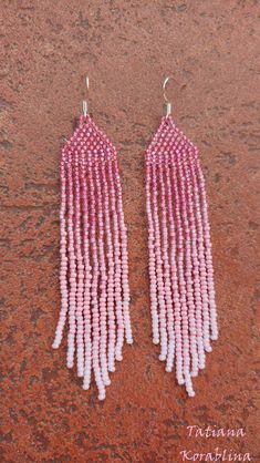 These unique handmade earrings are made of high-quality Czech beads and strong synthetic thread. They are elegant, fashionable, and highly versatile, suitable for everyday wear. Color:pink . 100% hand made with love! Measurements: Length-about 11.5cm (4.33 inch) Width -about 2 cm (0.79 inch) Materials: Sterling silver components Czech glass beads Nylon Thread Pink Fringe Earrings, Pink Tassel Drop Earrings With Dangling Beads, Pink Tassel Drop Earrings, Adjustable Pink Tassel Drop Earrings, Pink Beaded Tassel Earrings For Summer, Pink Tassel Beaded Earrings For Summer, Summer Pink Beaded Tassel Earrings, Pink Beaded Tassel Drop Earrings, Pink Tassel Drop Beaded Earrings