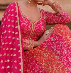 COLOR : Orange & Pink FABRIC : Gown & Dupatta - Premium Georgette WORK : Heavy Zari Work, Hand Work, Motifs, Stones, Pearls, Swarvoski, Sequins, Embellished Lace Border OCCASION : Wedding, Reception, Engagement, Bridal Wear READY-TO-WEAR : NoSTITCHING : Available as semi-stitched fabric, can be stitched using standard size option (+$30). Note: There might be a slight color variation due to lighting and flash used during photoshoot. The bright shade seen is the best closer view of fabric's color. Fitted Anarkali Gown With Intricate Embroidery, Fitted Anarkali Dress With Intricate Embroidery, Multicolor Dabka Work Dresses For Reception, Multicolor Dresses With Dabka Work For Reception, Fitted Anarkali Gown With Resham Embroidery, Anarkali Gown With Zari Work, Semi-stitched, Fitted Floor-length Anarkali Set With Intricate Embroidery, Intricately Embroidered Fitted Gown For Eid, Festive Traditional Gown With Fitted Bodice